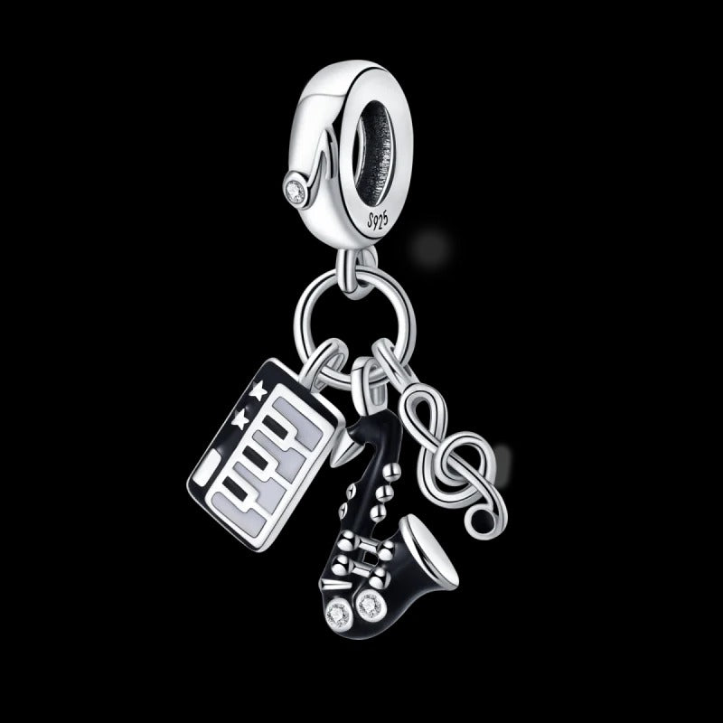 Keyboard, Saxophone, and Music Note Charm